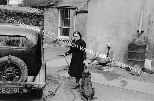 ESTHER MURPHY WASHING CANON'S CAR